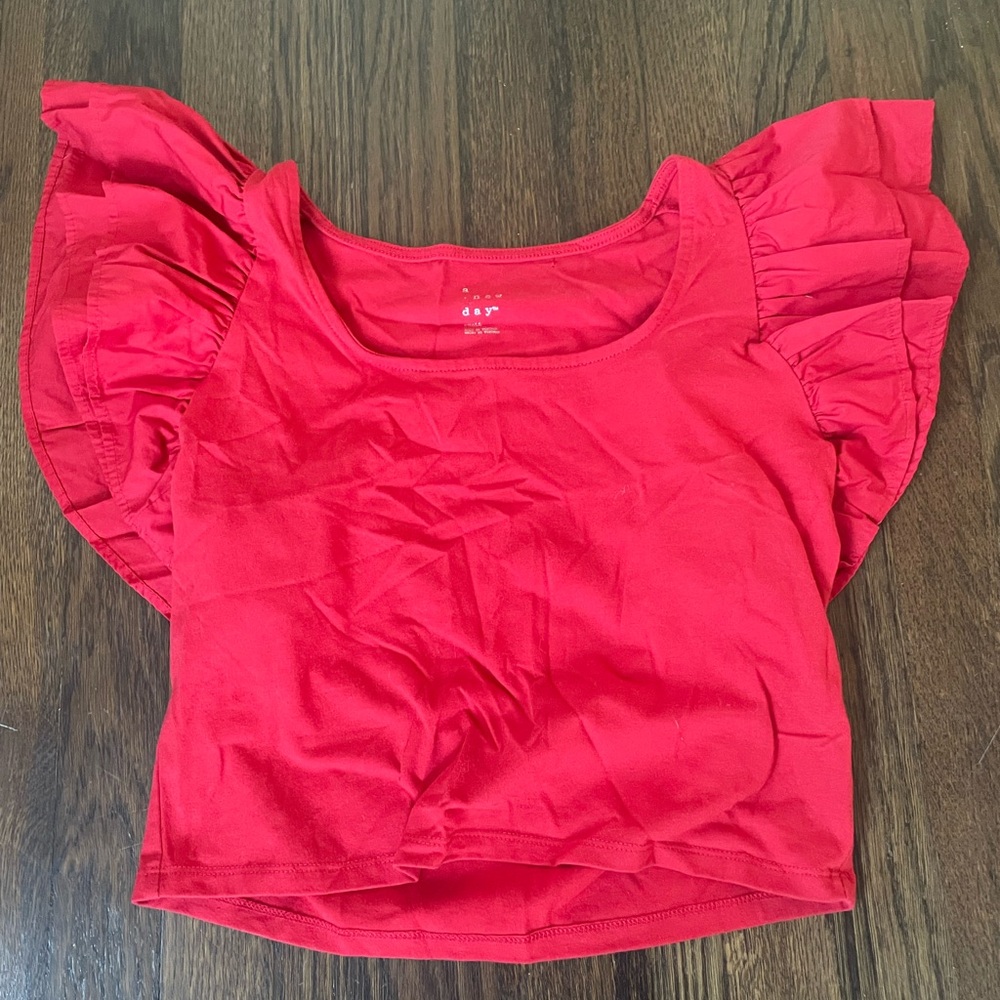A new day red top with big sleeves
